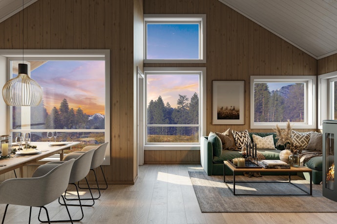 Brunbeiset, lun stue og spisestue med grå stoler. Arealeffektivt, store vinduer gir godt med lys inn.