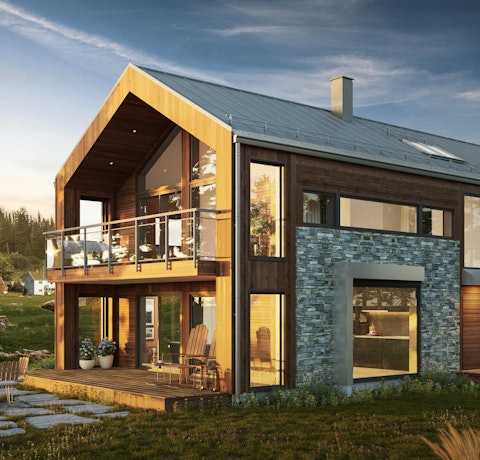 Brunbeiset hus, modell Ode 6.0 med brytningsfelt i skifer. Inntrukket gavl og store, fotside vinduer. Solnedgang i landlige omgivelser med hagemøbler.