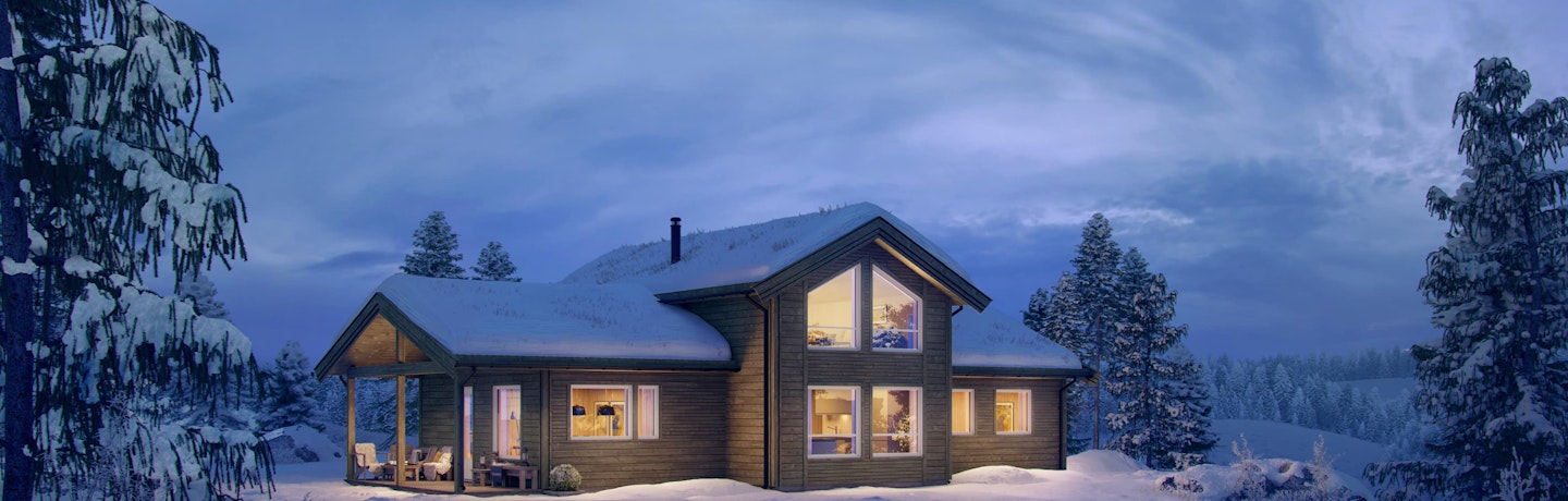 Mørk brunbeiset hytte i vinterdrakt. Stor overbygd uteplass. Store vinduer gir lys inn til koselig oppstugu. Hyttemodellen Brakar har godt med plass til storfamilien.