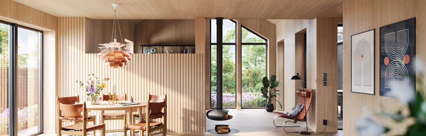 Fra den åpne kjøkken- og stuefløyen i atriumhuset Geneva. Himling, vegger og gulv er i tre. Møbler og interiørdetaljer har et organisk og naturlig uttrykk.