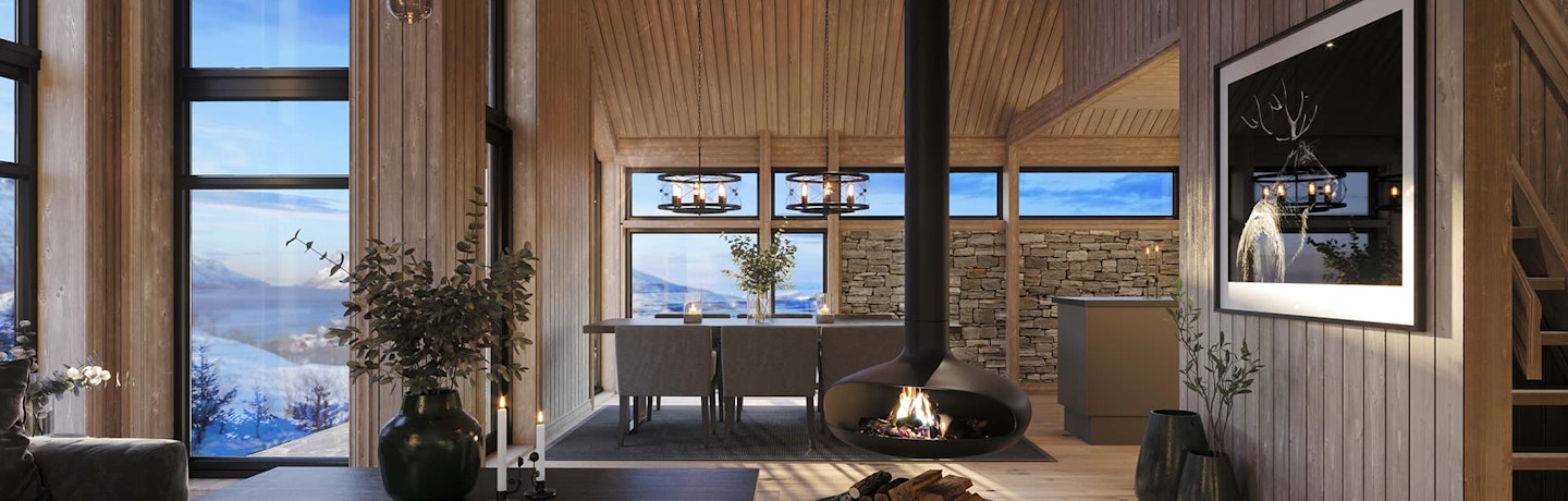 Interiørillustrasjon av hytte Magna Ferentis med vinterlandskap utenfor vinduene.