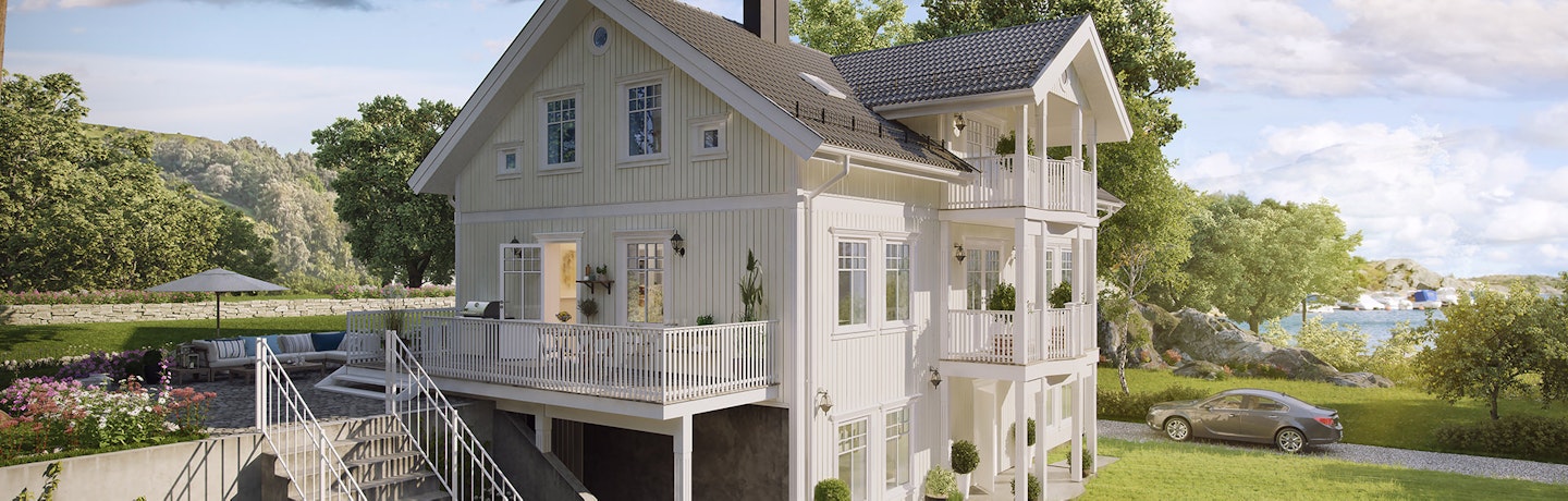 Hoelsgaard er et hus i tre etasjer med utleie, her vist frem på en skrå tomt med en frodig, grønn hage.