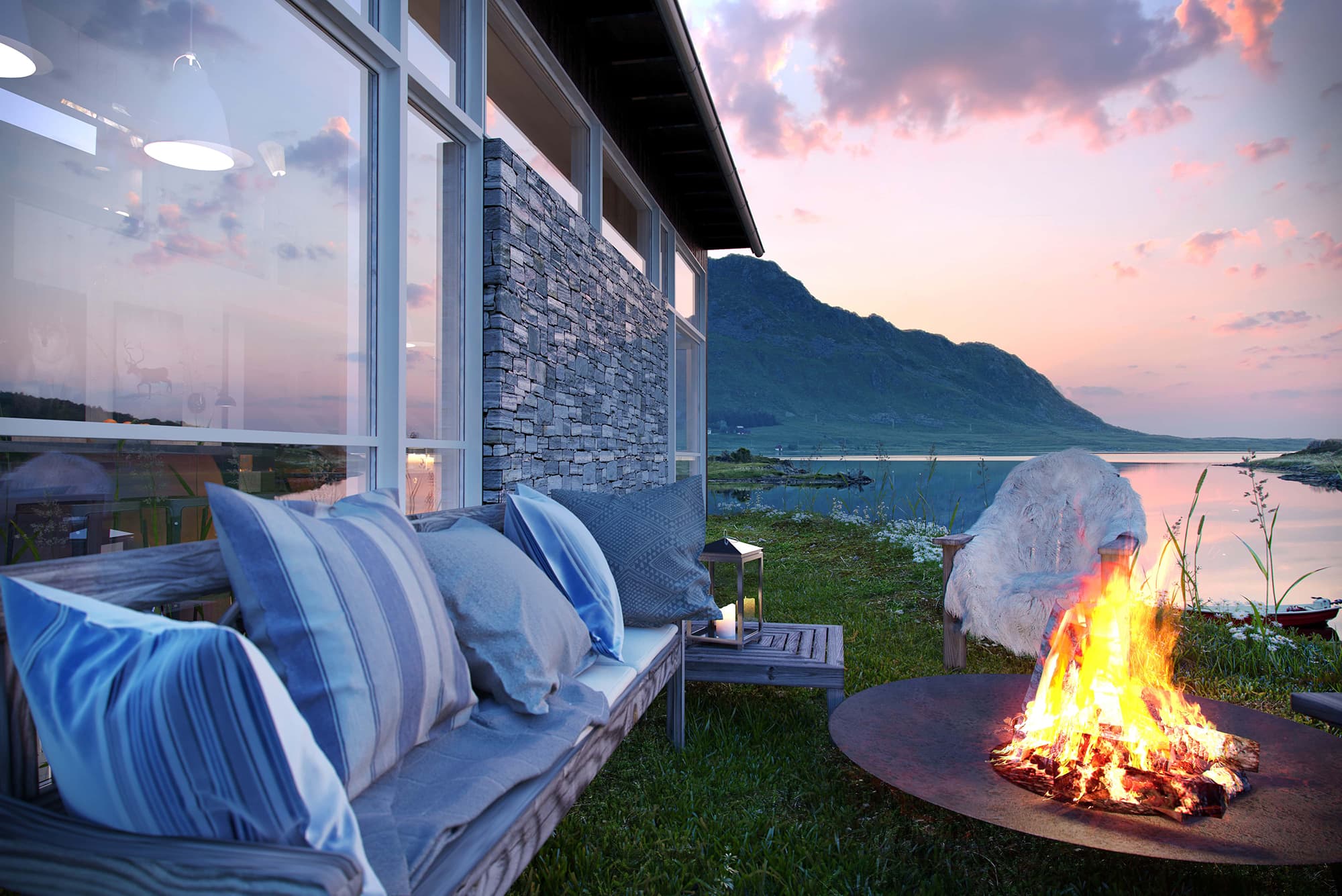 En stemningsfull illustrasjon som viser uteplass ved hyttemodellen Foris. Det er fyr i b&aring;lpanna og fin kveldsstemning.