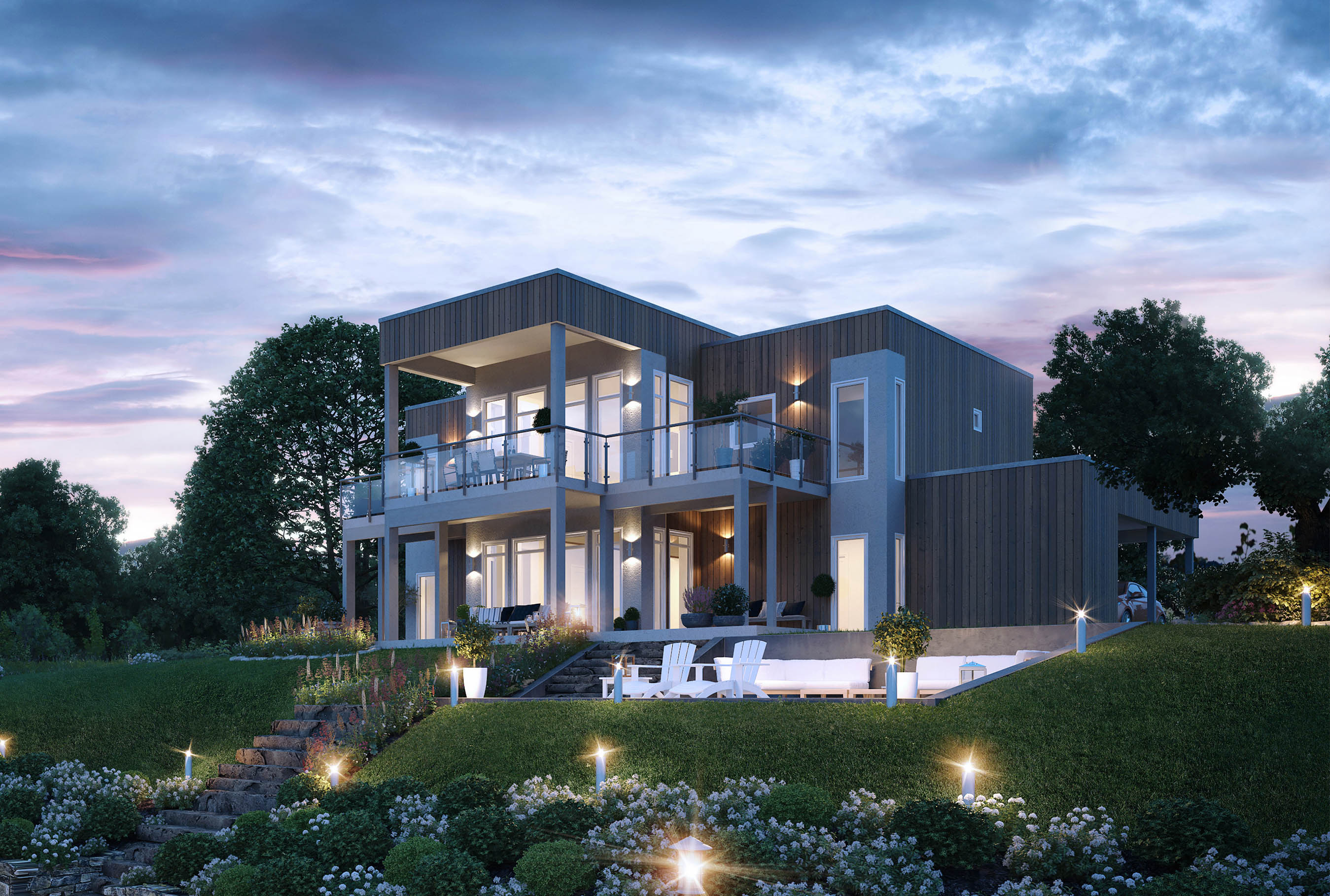 Illustrasjonsfoto av Funkishuset Trieste fra Boligpartner. Bildet er tatt på kvelden som viser hvordan lyssettingen er på funkishuset i solnedgangen.