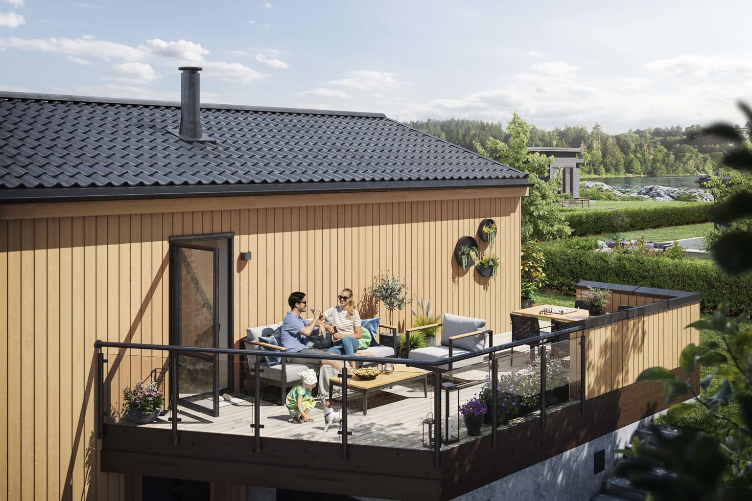 Flott uteplass i husmodell Garda plassert på skrå tomt.