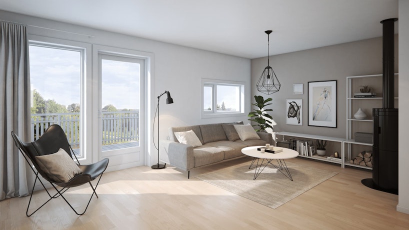 Hvit stue fra en leilighet i tomannsboligen Pan. Med beige treseters sofa, sommerfuglstol og hyllesystemer.