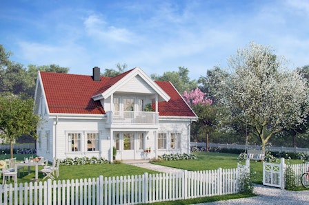Sjarmerende hvitt hus med rød taksten i koselig hage, med hvitt stakittgjerde rundt. Husmodellen Aprilvår har to etasjer og overbygd terrasse.